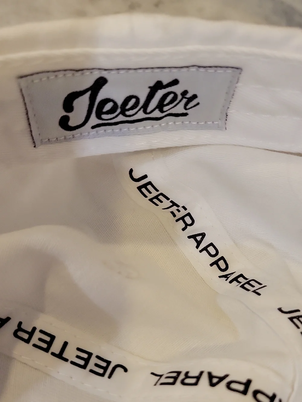 Jeeter white adjustable back baseball cap, OS